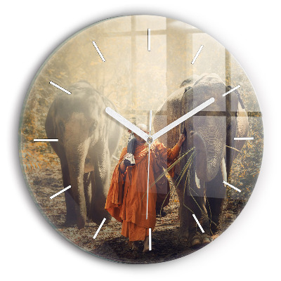 Round glass wall clock Monk leading elephants