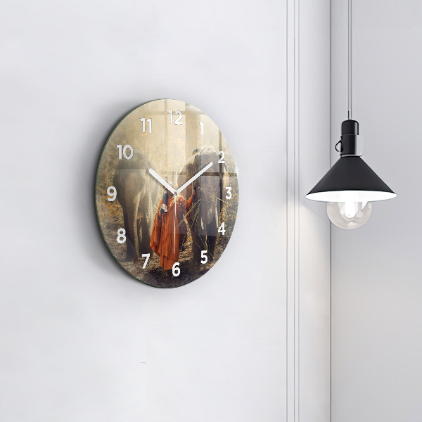 Round glass wall clock Monk leading elephants