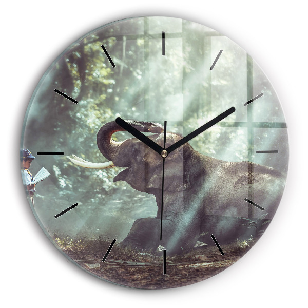 Round glass wall clock A boy is reading a book