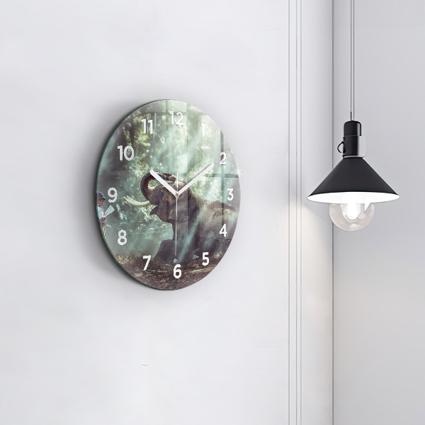 Round glass wall clock A boy is reading a book
