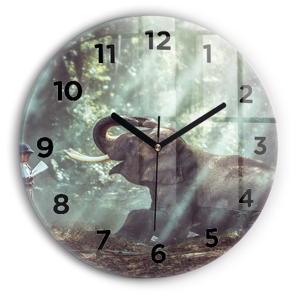 Round glass wall clock A boy is reading a book