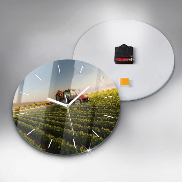 Round glass wall clock Tractor in a farm field