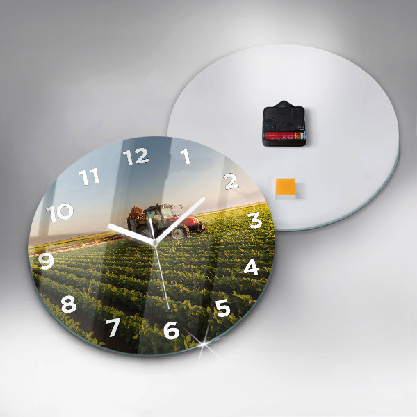 Round glass wall clock Tractor in a farm field