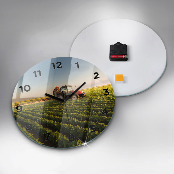Round glass wall clock Tractor in a farm field