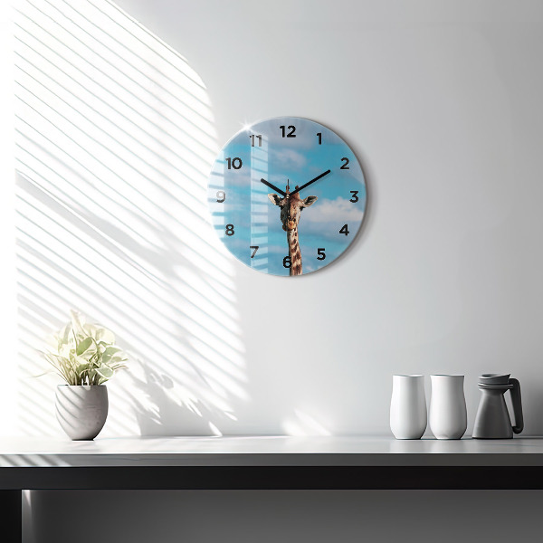 Round glass wall clock Giraffe head against the sky