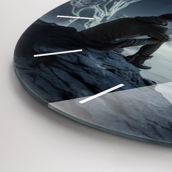 Round glass wall clock Man in front of the moon