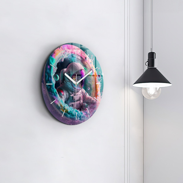 Round glass wall clock Cosmonaut and colorful clouds