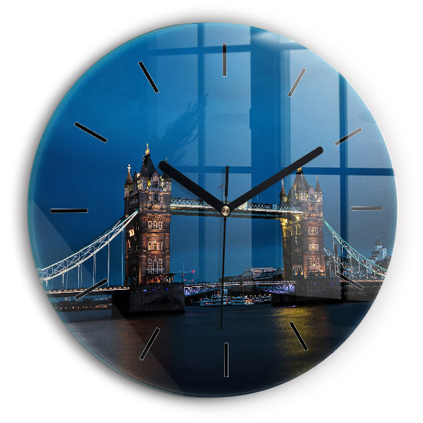 Round glass wall clock Tower Bridge London at night