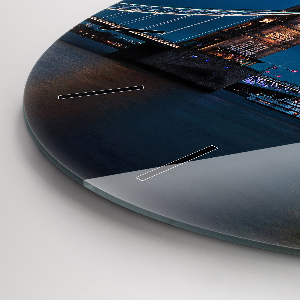 Round glass wall clock Tower Bridge London at night