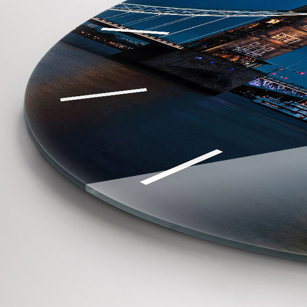 Round glass wall clock Tower Bridge London at night