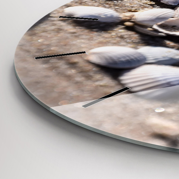 Round glass wall clock Seashells on the beach