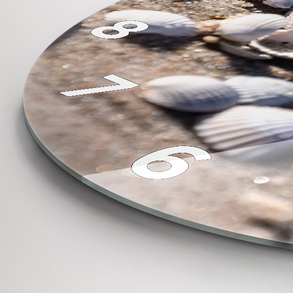 Round glass wall clock Seashells on the beach
