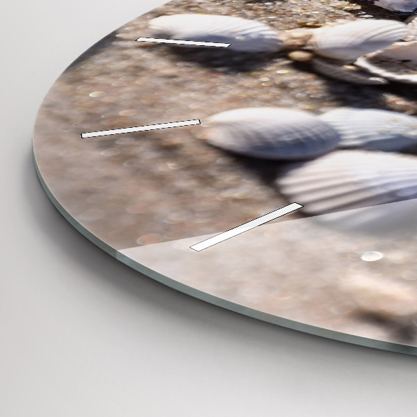 Round glass wall clock Seashells on the beach