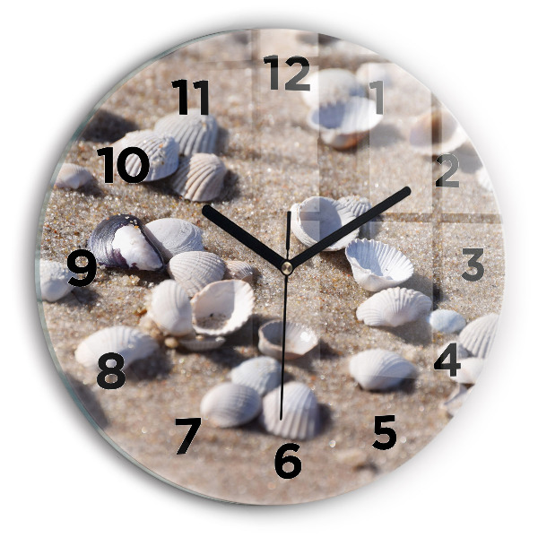 Round glass wall clock Seashells on the beach