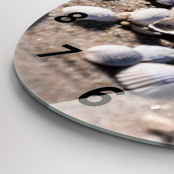 Round glass wall clock Seashells on the beach