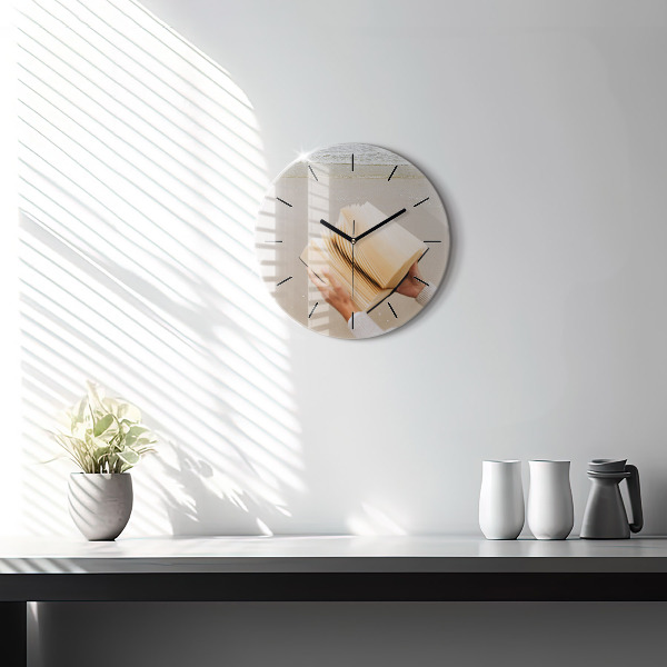 Round glass wall clock A moment with a book
