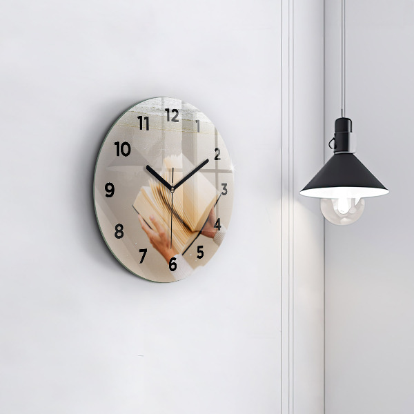 Round glass wall clock A moment with a book