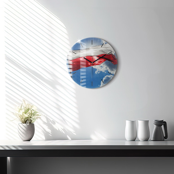 Round glass wall clock The Polish flag against the sky