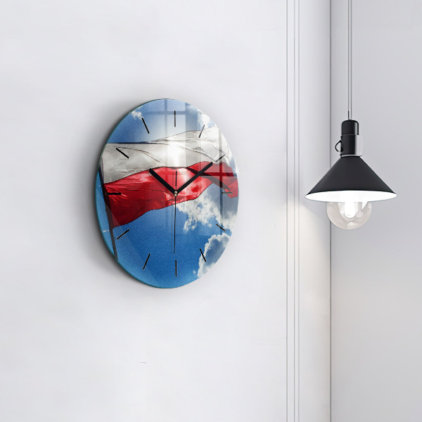 Round glass wall clock The Polish flag against the sky