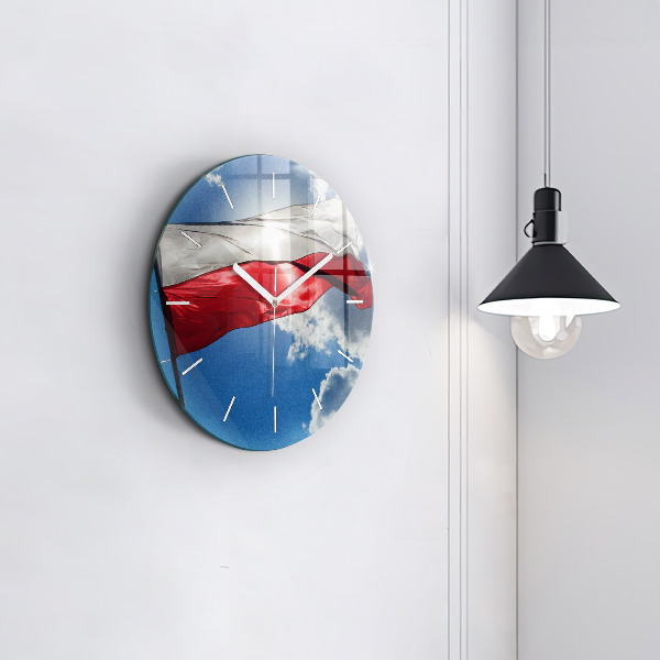 Round glass wall clock The Polish flag against the sky