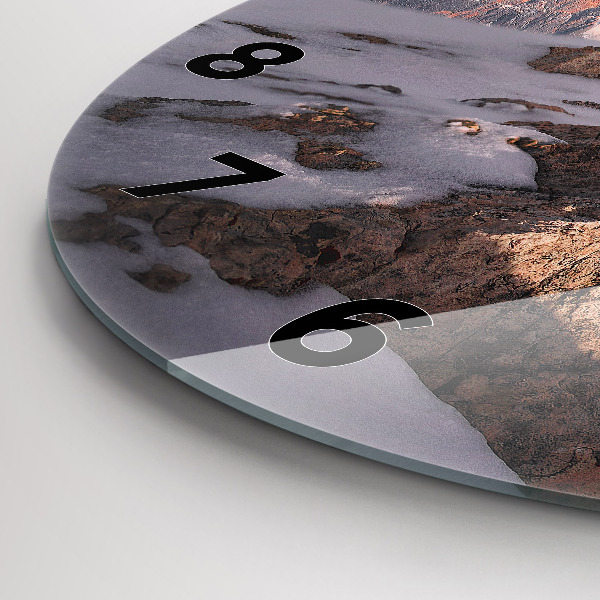 Round glass wall clock A mountain covered in snow