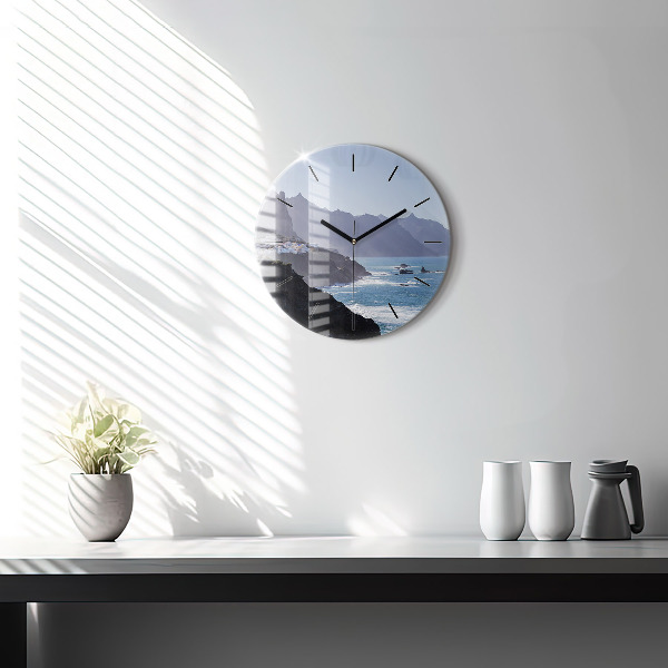 Round glass wall clock Mountains by the ocean