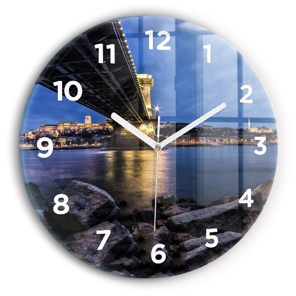 Round glass wall clock Rocky shore under the bridge
