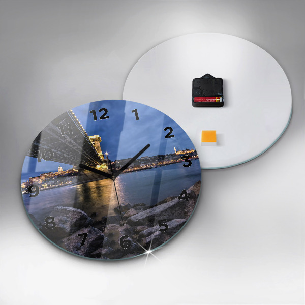Round glass wall clock Rocky shore under the bridge