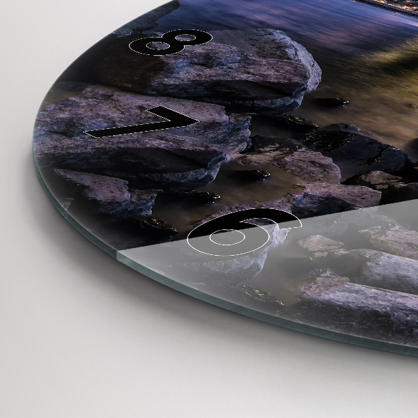 Round glass wall clock Rocky shore under the bridge