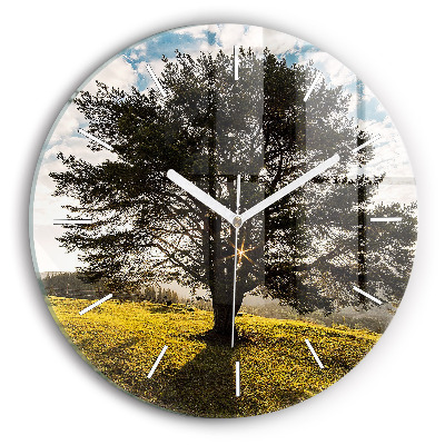 Round glass wall clock A tree on a hill