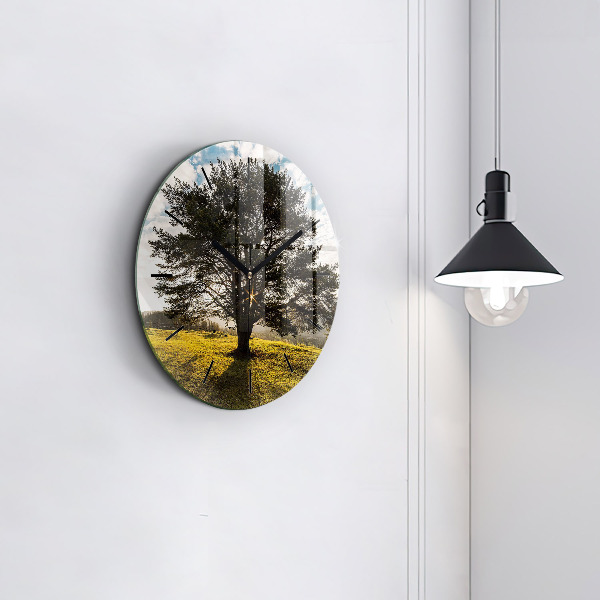 Round glass wall clock A tree on a hill