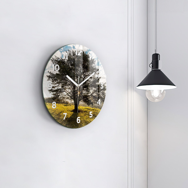 Round glass wall clock A tree on a hill