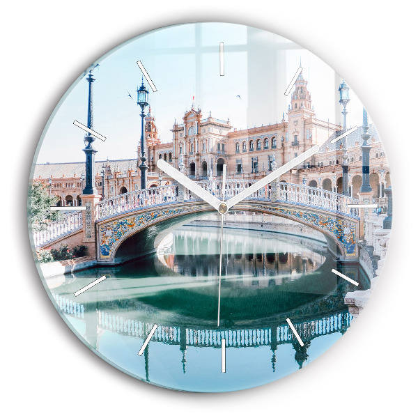 Round glass wall clock Plaza de Espana in Seville