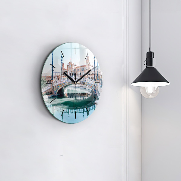 Round glass wall clock Plaza de Espana in Seville