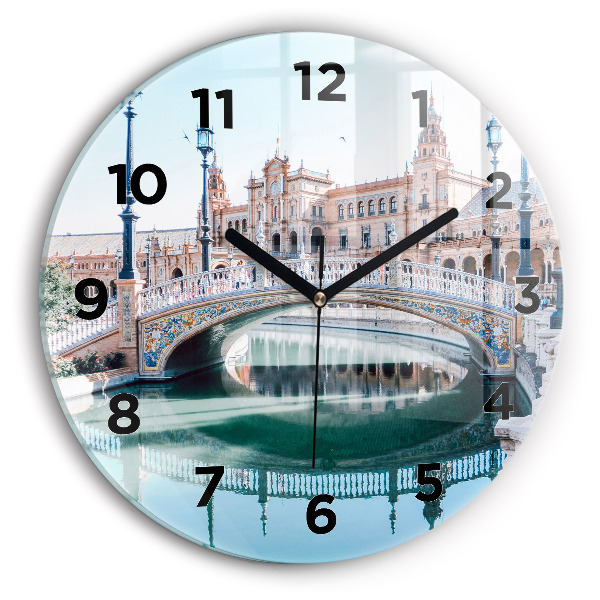 Round glass wall clock Plaza de Espana in Seville