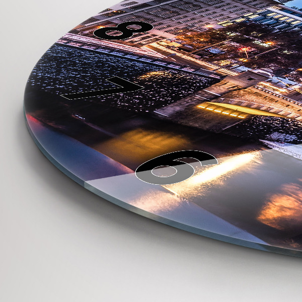 Round glass wall clock Panorama of the city of Pilsen