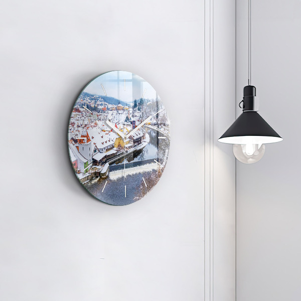 Round glass wall clock Panorama of the city in winter