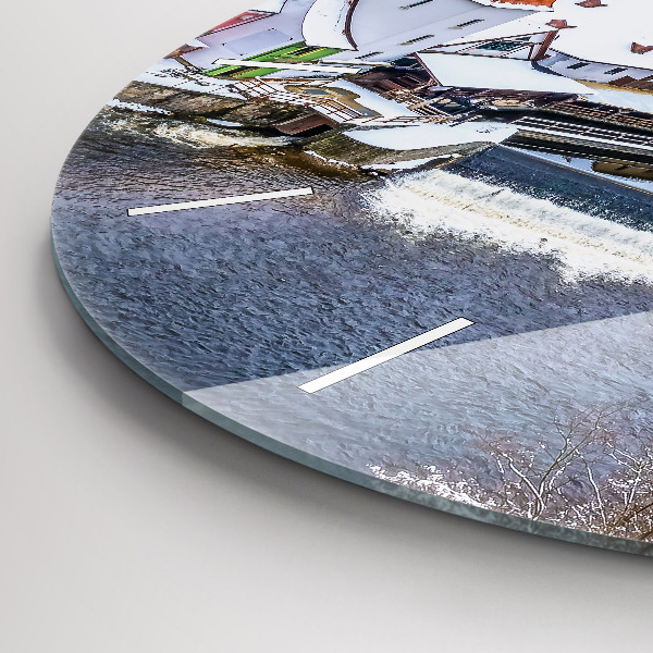 Round glass wall clock Panorama of the city in winter