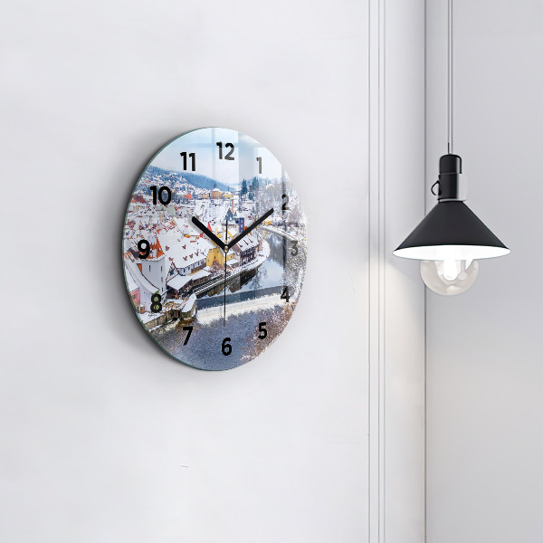 Round glass wall clock Panorama of the city in winter