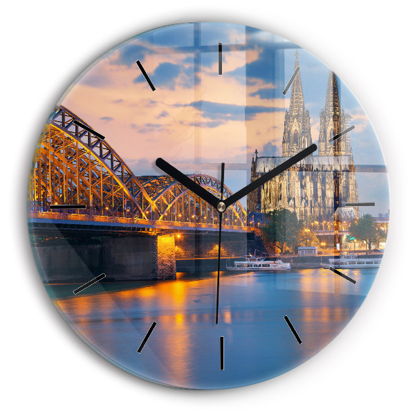 Round glass wall clock View of the town hall