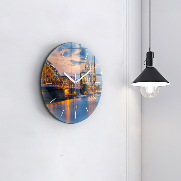 Round glass wall clock View of the town hall