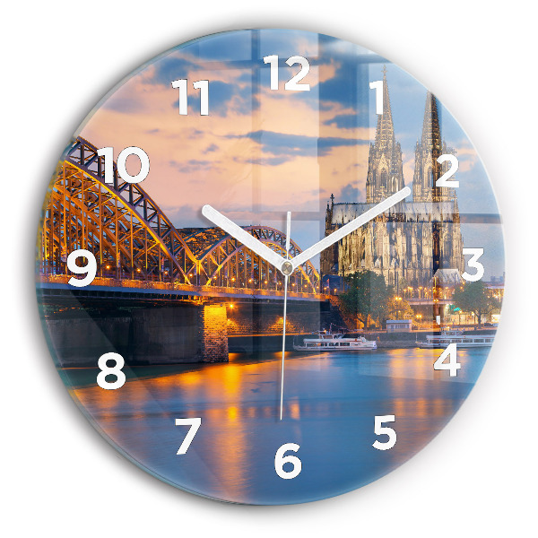 Round glass wall clock View of the town hall