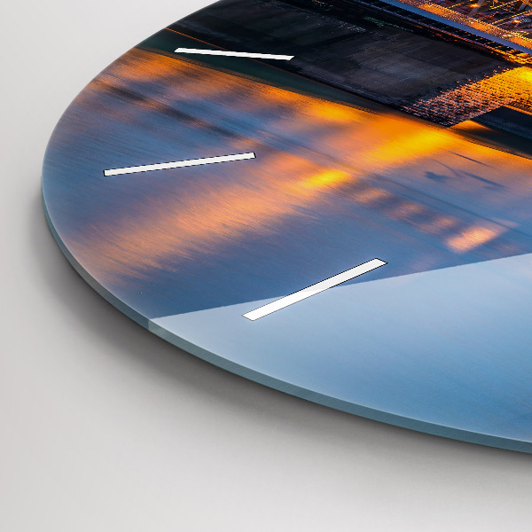Round glass wall clock View of the town hall