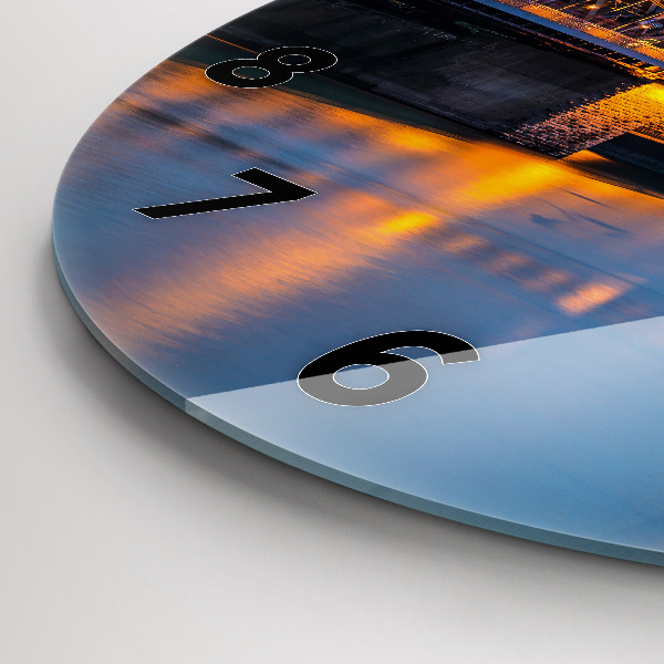Round glass wall clock View of the town hall