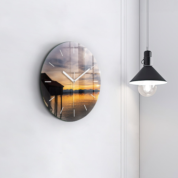 Round glass wall clock Sunset over the lake