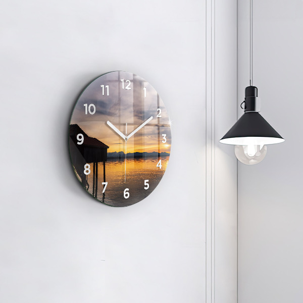Round glass wall clock Sunset over the lake