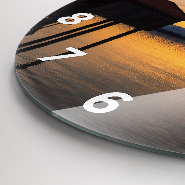Round glass wall clock Sunset over the lake