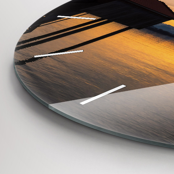 Round glass wall clock Sunset over the lake