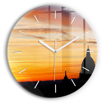 Round glass wall clock Building and sunset
