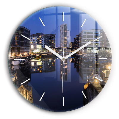 Round glass wall clock The city lit up at night
